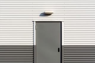 Blinder une porte existante ou changer de bloc-porte ?
